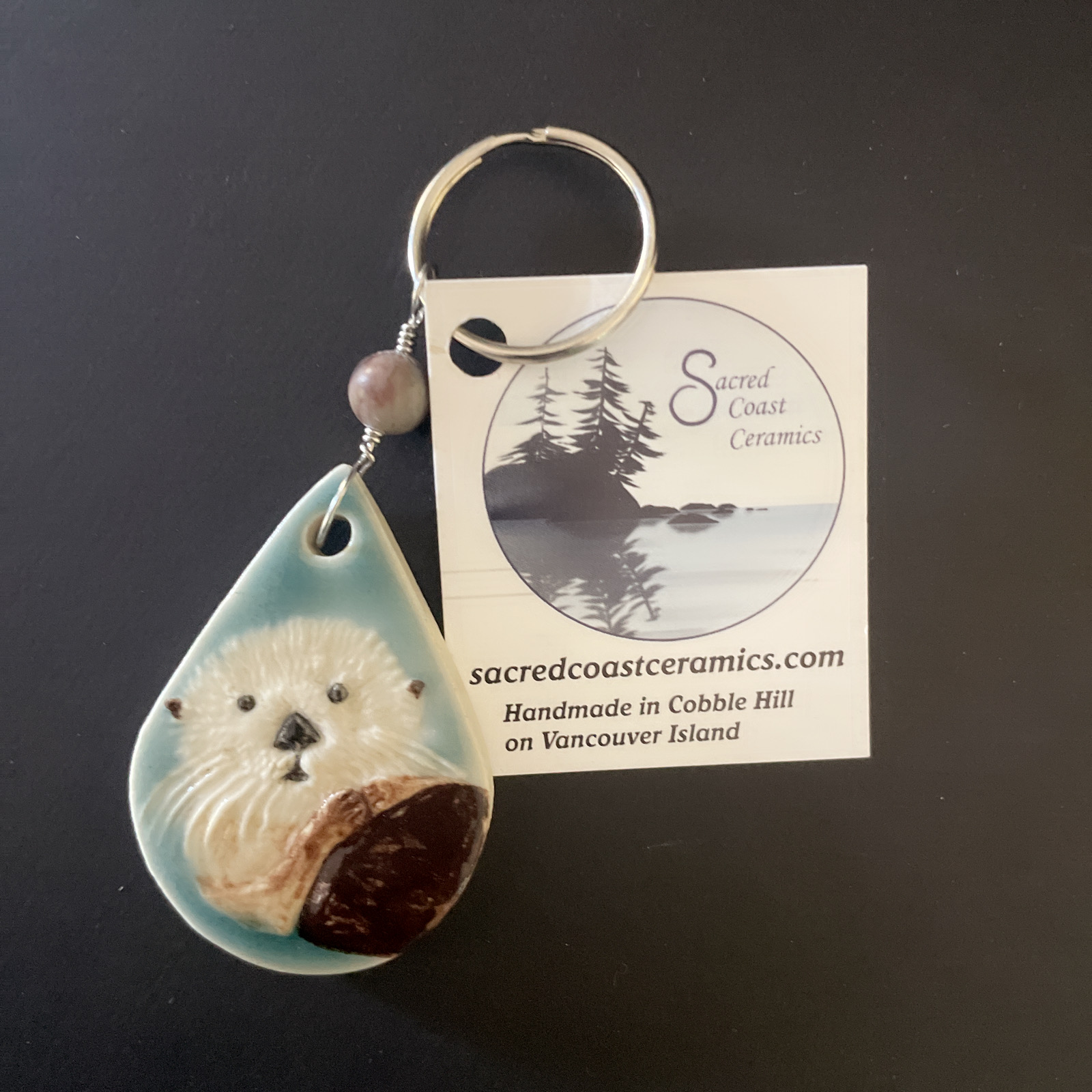 Sacred Coast Ceramics: Seal Keychain on Log